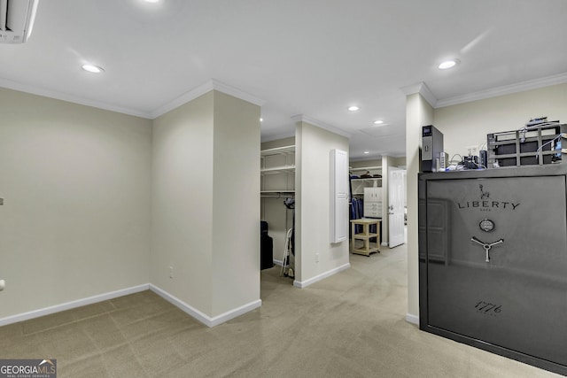 corridor with recessed lighting, light carpet, crown molding, and baseboards