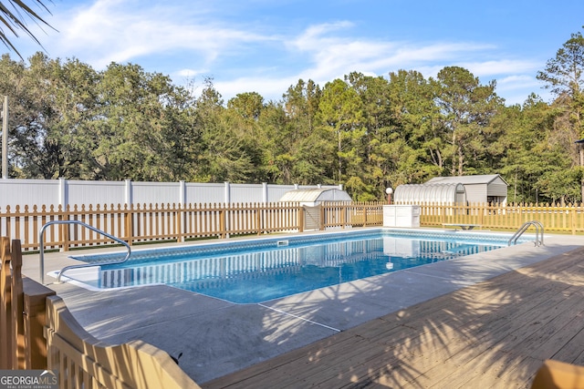 view of pool featuring a fenced in pool and fence