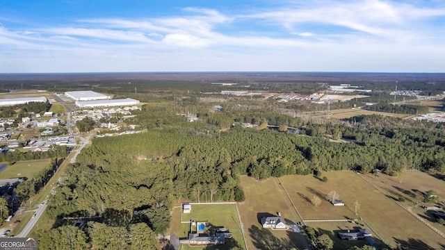 aerial view featuring a forest view