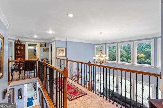 corridor with crown molding, recessed lighting, a notable chandelier, and an upstairs landing