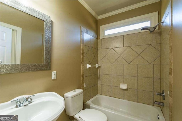 full bath with toilet, shower / tub combination, ornamental molding, and a sink