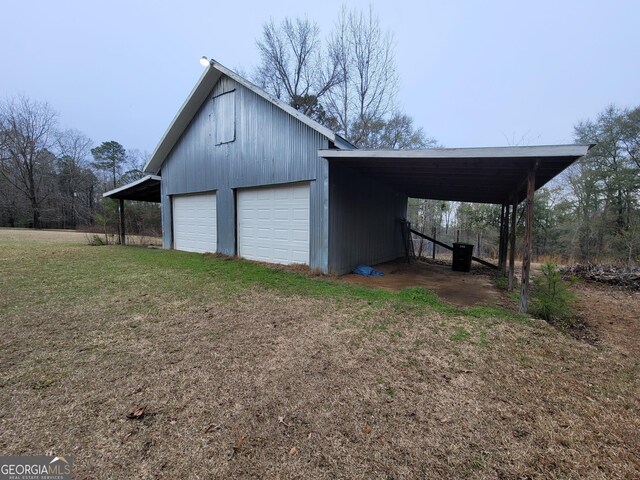 view of yard with a garage