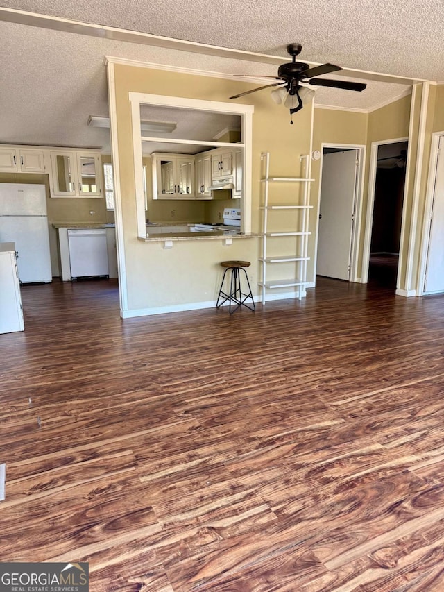 unfurnished living room with a ceiling fan, dark wood-style flooring, and a textured ceiling