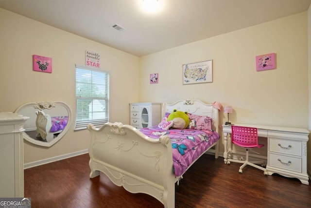 bedroom with baseboards, visible vents, and dark wood-style flooring