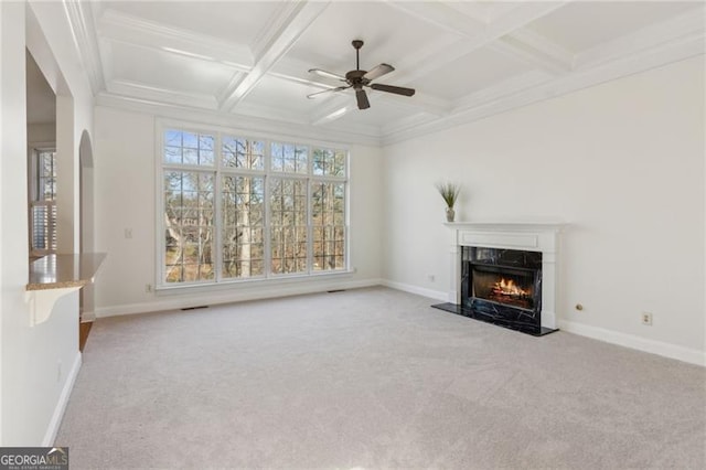 3690 Millwater Xing, Dacula, GA 30019 - unfurnished living room featuring a fireplace, carpet, ceiling fan, arched walkways, and coffered ceiling