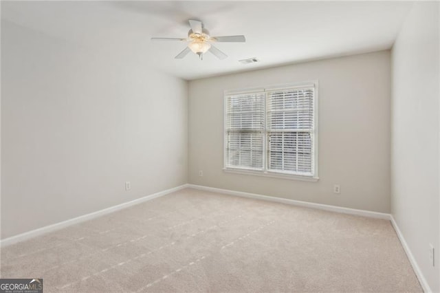 3690 Millwater Xing, Dacula, GA 30019 - unfurnished room with light colored carpet and ceiling fan