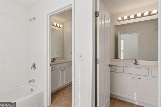 3690 Millwater Xing, Dacula, GA 30019 - full bathroom featuring tile patterned flooring, washtub / shower combination, and vanity