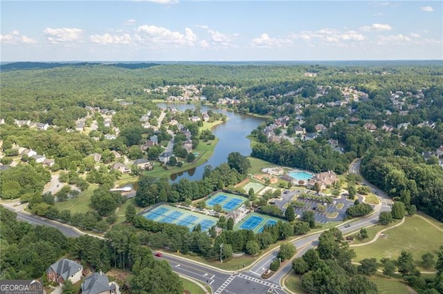 3690 Millwater Xing, Dacula, GA 30019 - drone / aerial view of a heavily wooded area and a large body of water