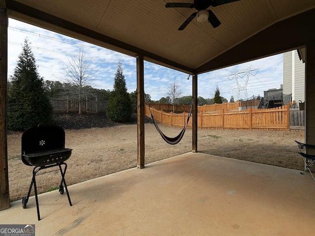 view of patio / terrace featuring a fenced backyard, grilling area, and a ceiling fan