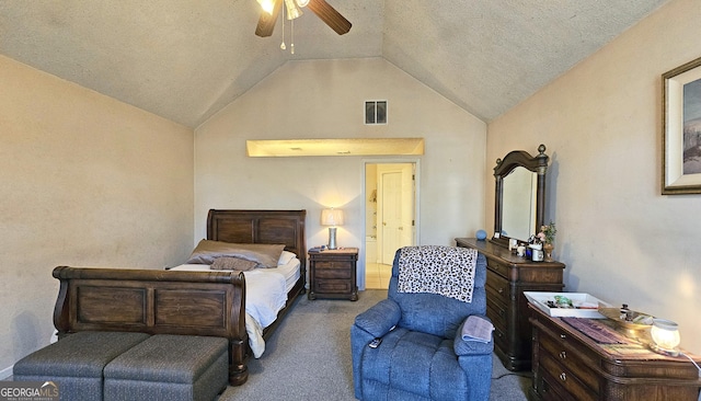 bedroom featuring lofted ceiling, a textured ceiling, visible vents, a ceiling fan, and carpet