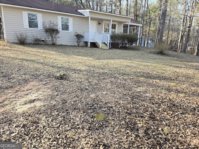 ranch-style home with crawl space and a front lawn