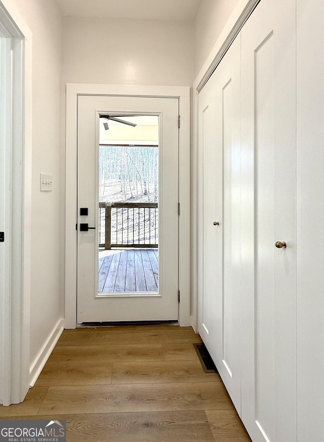 entryway featuring light wood-style floors