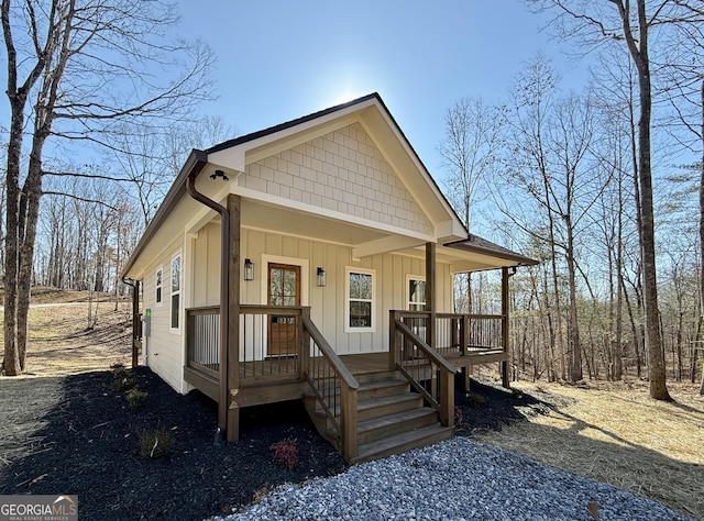 view of front of property with board and batten siding and a porch