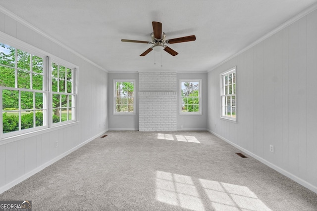 unfurnished room with light carpet, visible vents, and ornamental molding