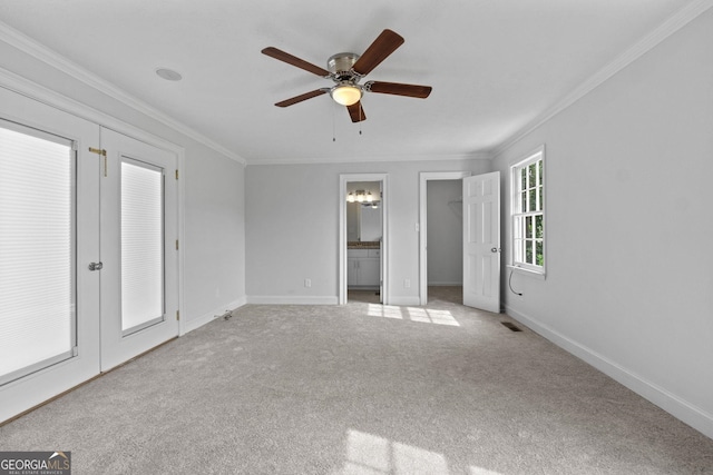 unfurnished bedroom featuring ornamental molding, french doors, light carpet, and baseboards