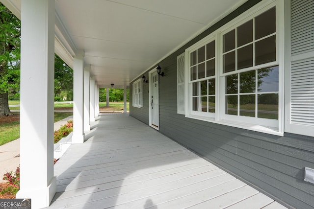 deck featuring covered porch