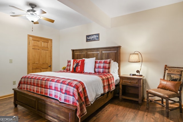 bedroom with dark wood-style flooring, baseboards, ceiling fan, and beam ceiling