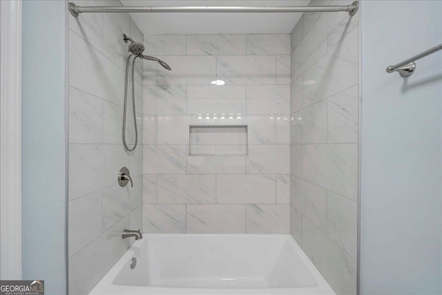 bathroom featuring washtub / shower combination