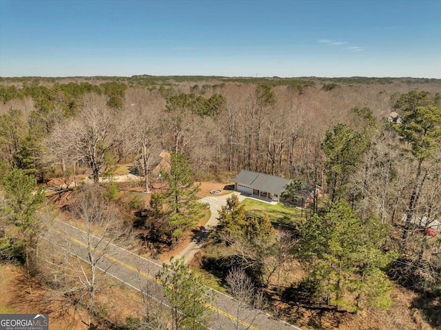 bird's eye view with a view of trees