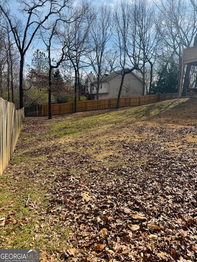 view of yard with fence