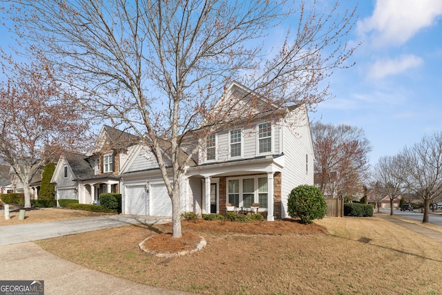 702 Berkeley Ter, Canton, GA 30115 - traditional-style house featuring concrete driveway, a porch, and a front lawn