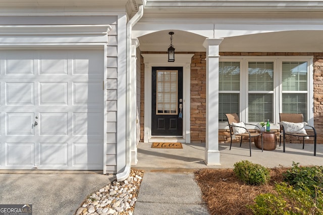 702 Berkeley Ter, Canton, GA 30115 - entrance to property featuring a porch and stone siding