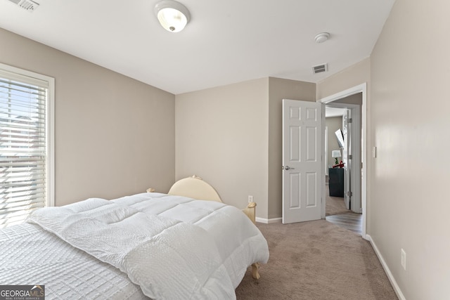 702 Berkeley Ter, Canton, GA 30115 - bedroom featuring light colored carpet and baseboards