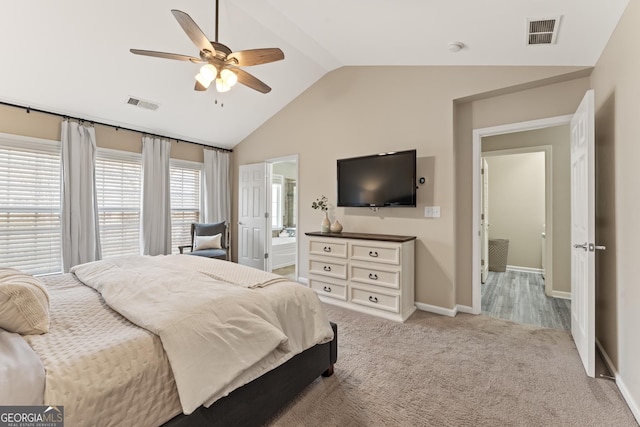 702 Berkeley Ter, Canton, GA 30115 - bedroom featuring vaulted ceiling, light colored carpet, baseboards, a ceiling fan, and ensuite bath