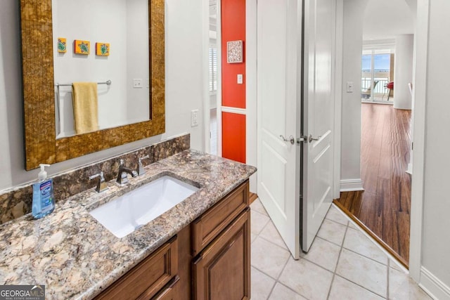 bathroom with vanity and tile patterned floors