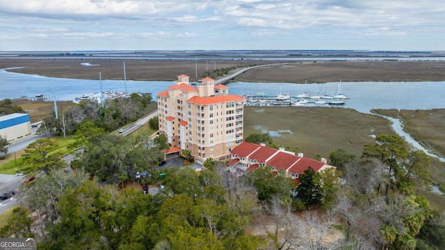 drone / aerial view with a water view