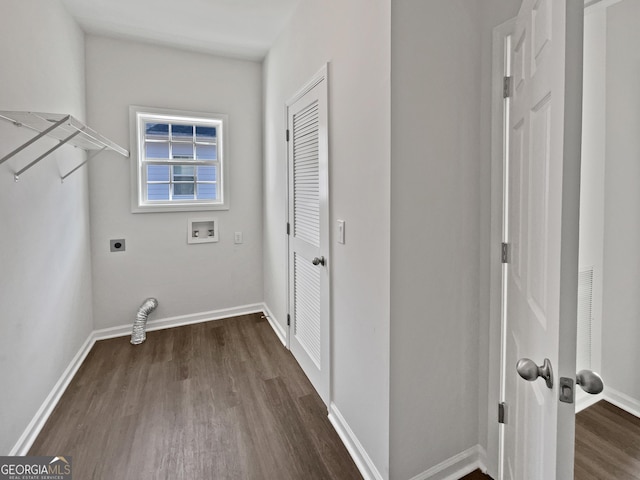 washroom featuring hookup for a washing machine, laundry area, dark wood-type flooring, baseboards, and electric dryer hookup