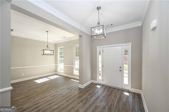 foyer with crown molding, dark wood-type flooring, visible vents, and baseboards