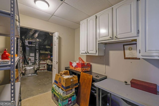 basement with a drop ceiling