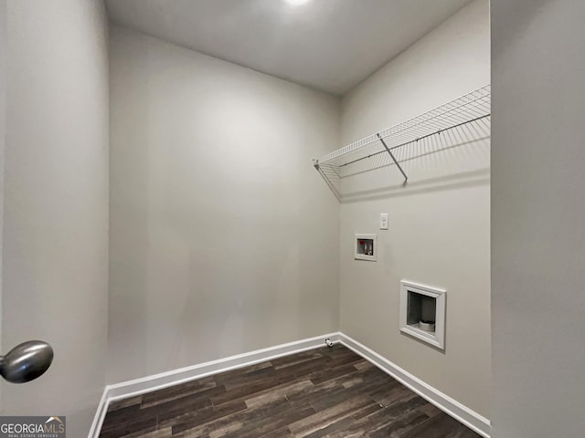 laundry room featuring laundry area, baseboards, washer hookup, and dark wood finished floors