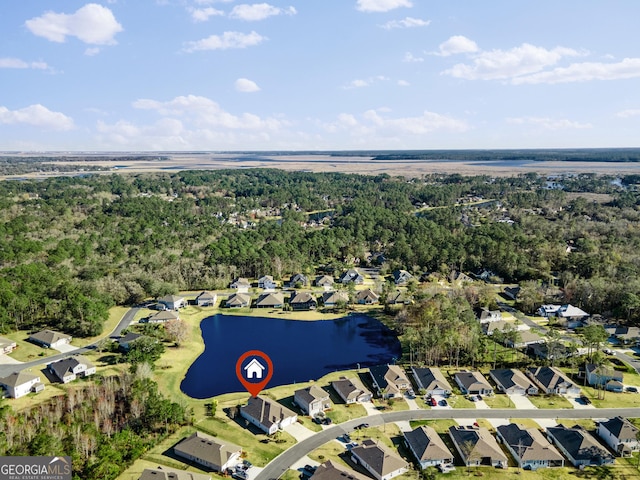 birds eye view of property with a water view and a residential view