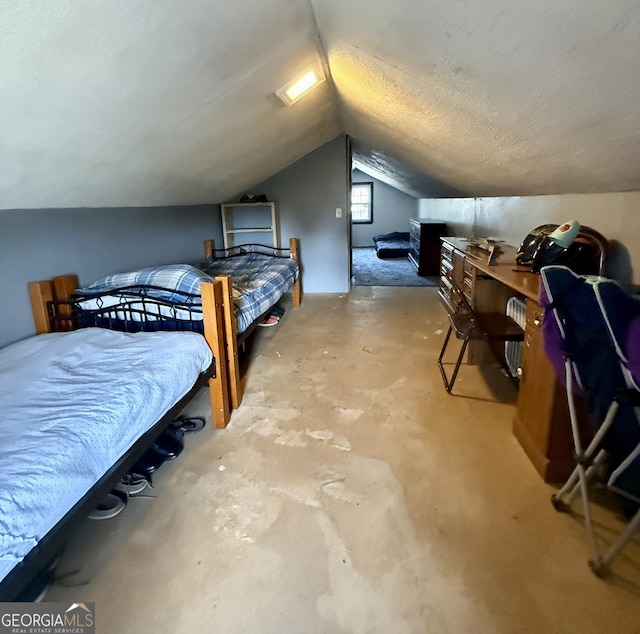 312 Schuman Dr, Bloomingdale, GA 31302 - bedroom featuring lofted ceiling and unfinished concrete flooring