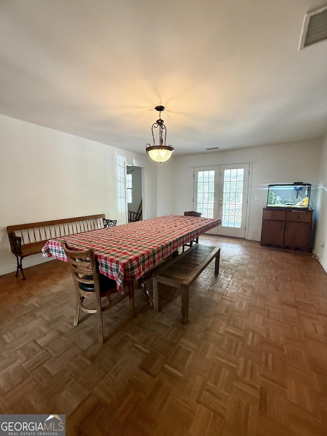 dining area featuring visible vents