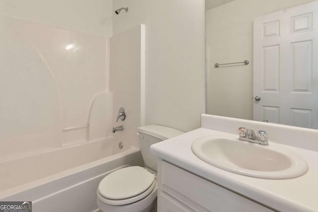 full bath with washtub / shower combination, vanity, and toilet