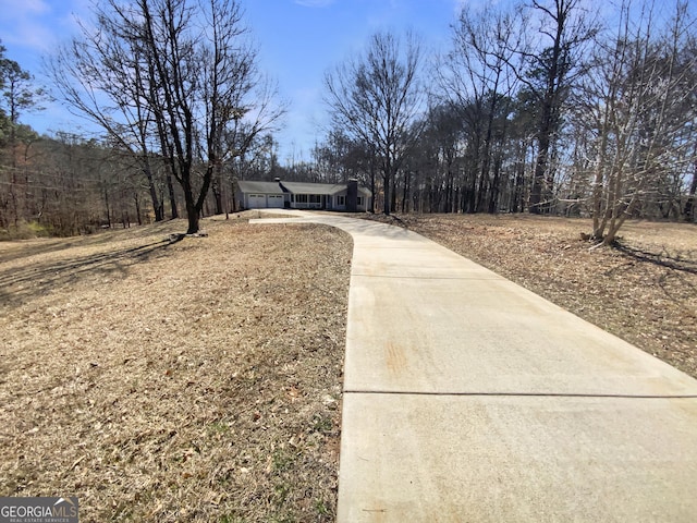 exterior space featuring driveway