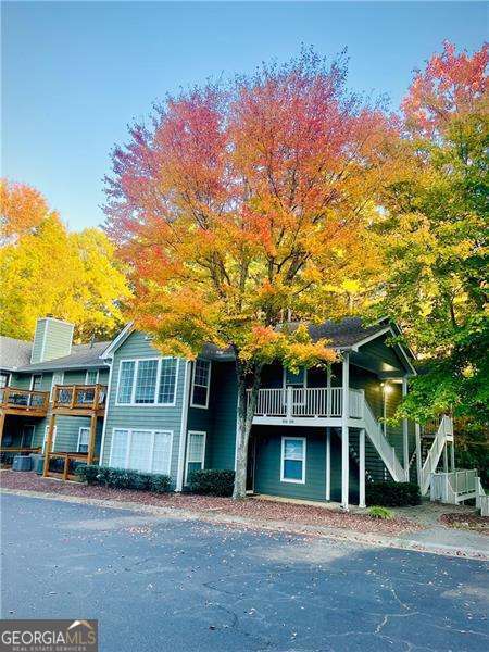 view of front of property with stairway