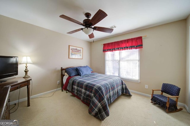 bedroom featuring carpet floors, visible vents, baseboards, and a ceiling fan