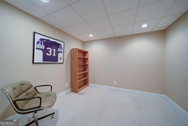 sitting room featuring baseboards, a drop ceiling, carpet flooring, and recessed lighting