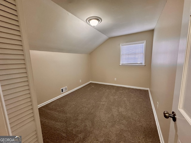 2430 Fern Valley Ct, East Point, GA 30344 - bonus room with dark carpet and lofted ceiling