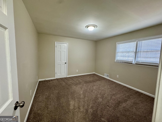 2430 Fern Valley Ct, East Point, GA 30344 - carpeted empty room with baseboards