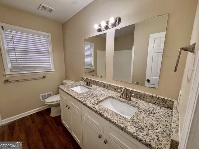 2430 Fern Valley Ct, East Point, GA 30344 - bathroom with double vanity and wood finished floors