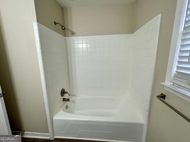 2430 Fern Valley Ct, East Point, GA 30344 - bathroom with shower / washtub combination and baseboards