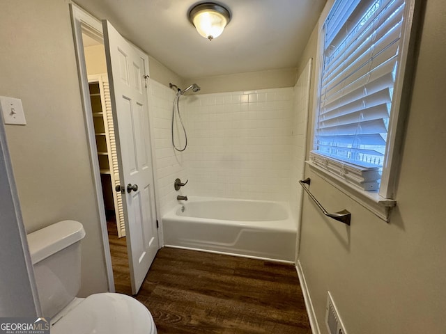 2430 Fern Valley Ct, East Point, GA 30344 - full bathroom featuring wood finished floors and shower / bath combination