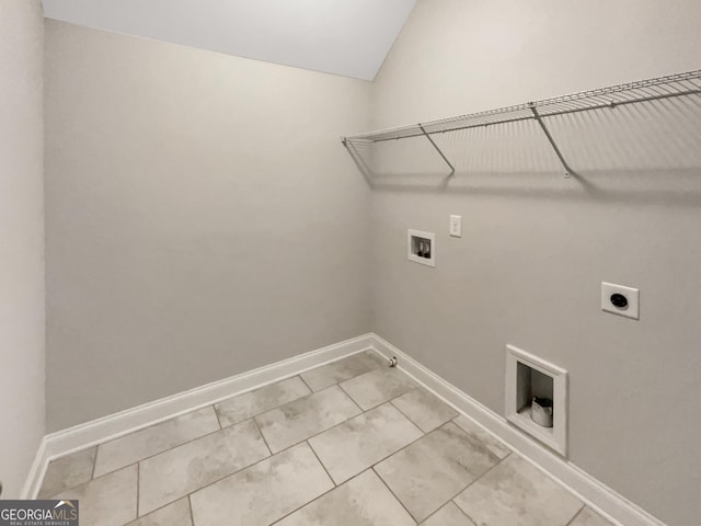 laundry room with hookup for a washing machine, gas dryer hookup, electric dryer hookup, laundry area, and baseboards