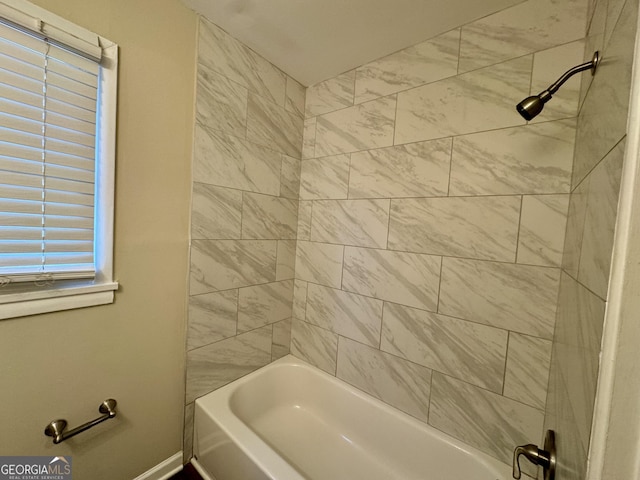 bathroom with washtub / shower combination