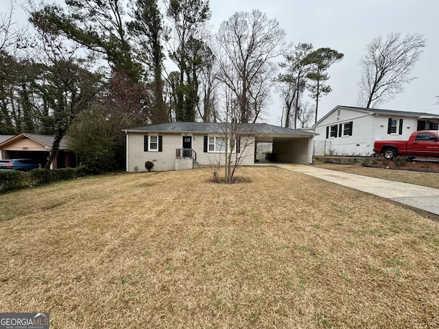 645 Steve Dr SW, Atlanta, GA 30315 - ranch-style home with driveway, a front yard, a carport, and brick siding